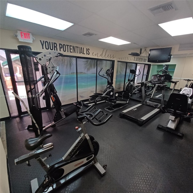 gym with a drop ceiling