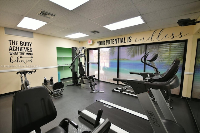 gym with a drop ceiling