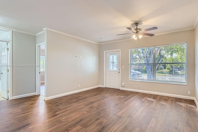 entryway featuring dark hardwood / wood-style floors, plenty of natural light, and ornamental molding