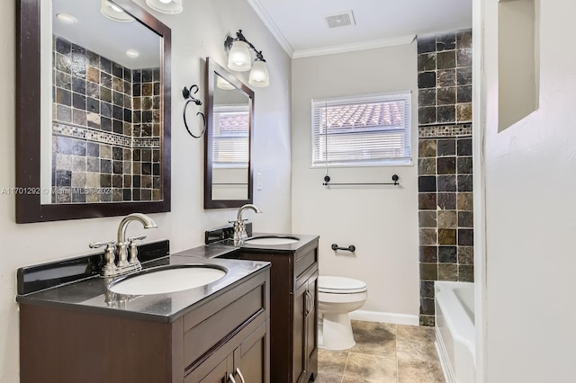 full bathroom featuring ornamental molding, vanity, tiled shower / bath combo, tile patterned flooring, and toilet