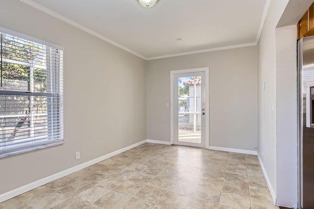 unfurnished room featuring crown molding