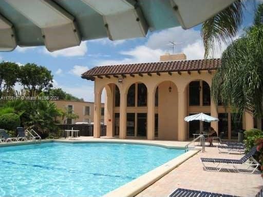 10776 N Kendall Dr Unit F-16, Miami, FL 33176 - community pool featuring a patio area