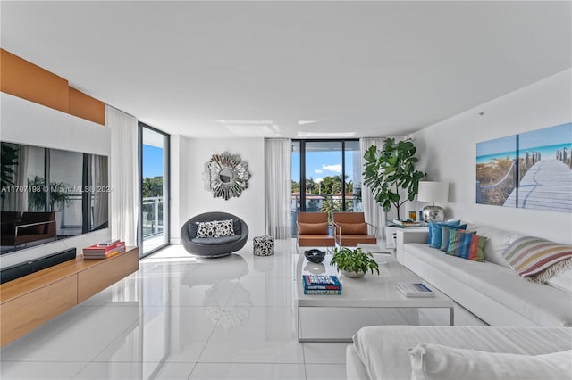 tiled living room with floor to ceiling windows