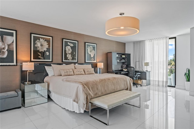 bedroom featuring light tile patterned flooring