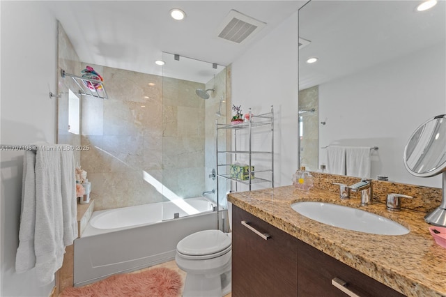 full bath with visible vents, shower / tub combination, vanity, toilet, and recessed lighting