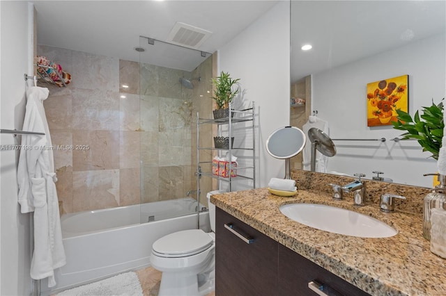 bathroom with visible vents, vanity, toilet, recessed lighting, and shower / tub combination