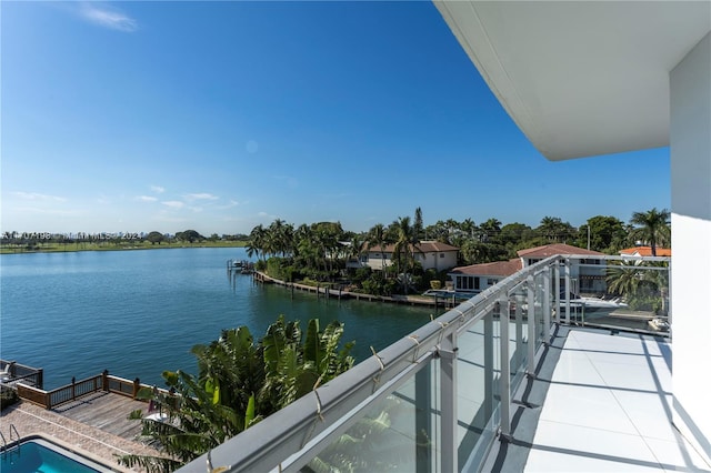 balcony featuring a water view