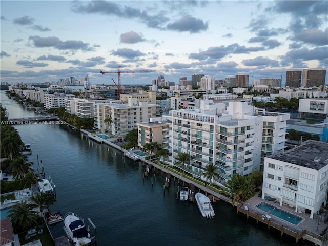 bird's eye view with a city view and a water view