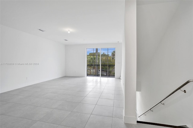 empty room featuring light tile patterned flooring