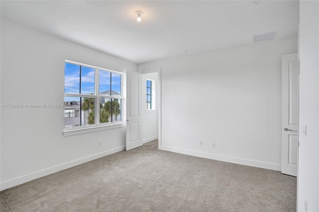 empty room featuring carpet floors