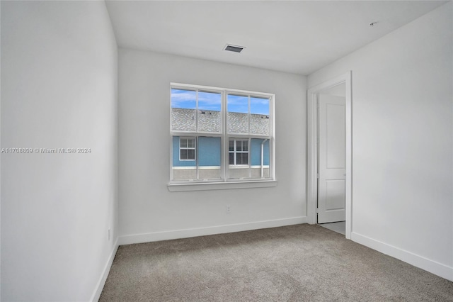 view of carpeted spare room