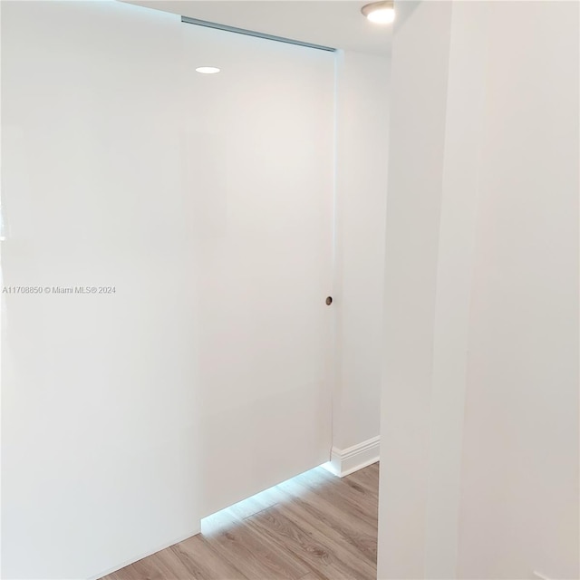 unfurnished room featuring light hardwood / wood-style floors