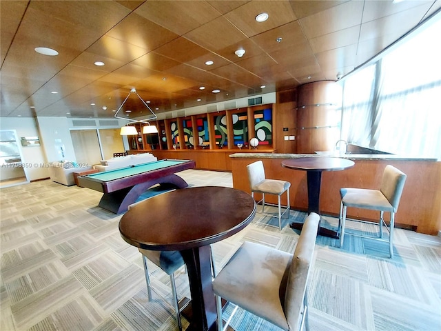 recreation room with light colored carpet and pool table