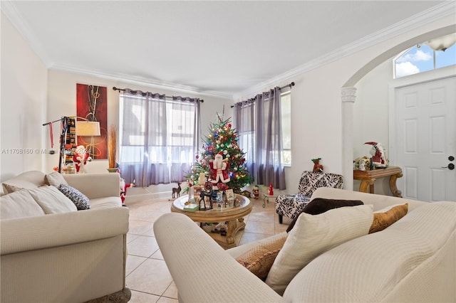 living room with a wealth of natural light, light tile patterned floors, and ornamental molding