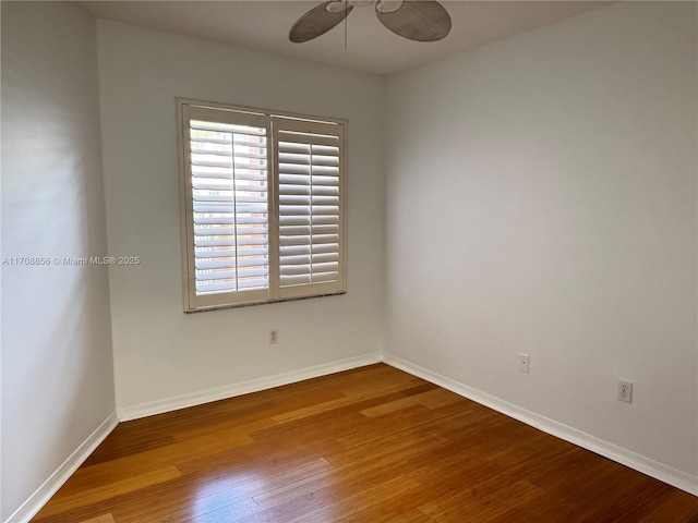 unfurnished room with ceiling fan and hardwood / wood-style floors