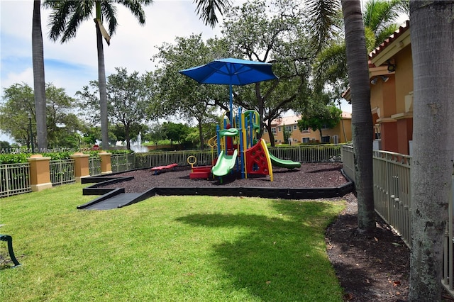 view of playground featuring a lawn