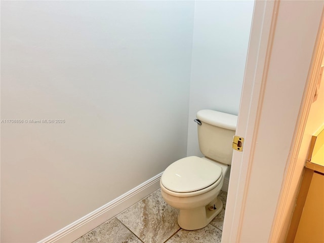 bathroom featuring toilet