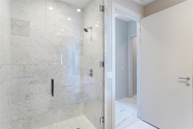 bathroom featuring an enclosed shower