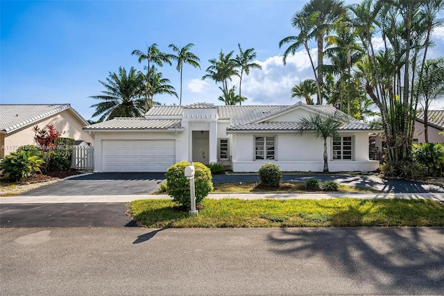 view of front of house with a garage