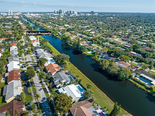 bird's eye view with a water view