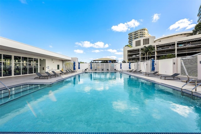 view of swimming pool featuring a patio