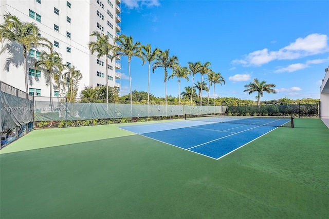 view of sport court with basketball hoop