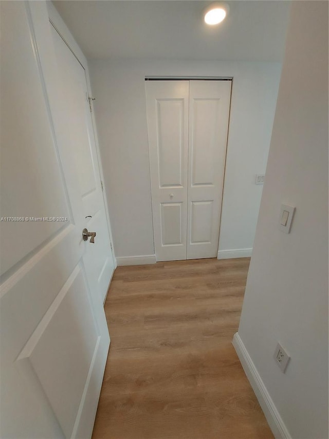 hall featuring light hardwood / wood-style flooring