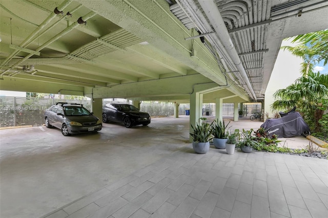 garage featuring a carport