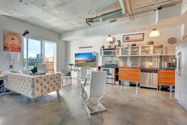 interior space featuring sink and concrete floors