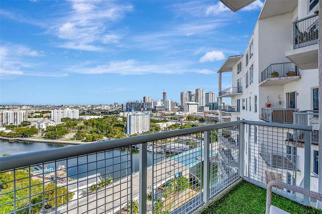 balcony featuring a water view