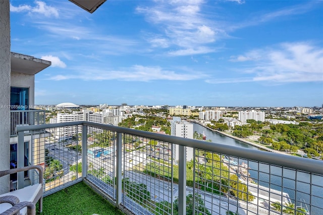 balcony featuring a water view