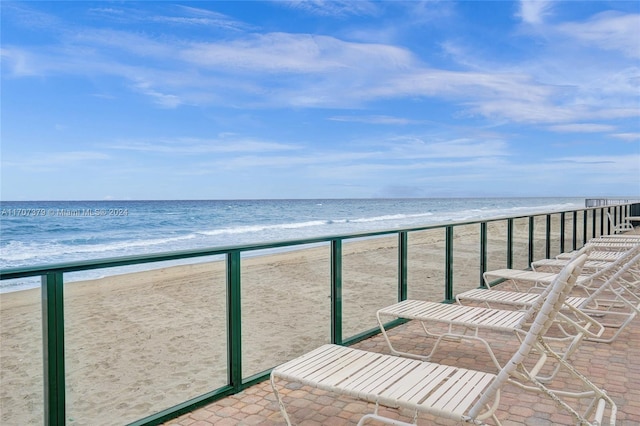 property view of water featuring a beach view