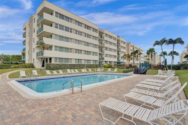 view of pool with a patio area