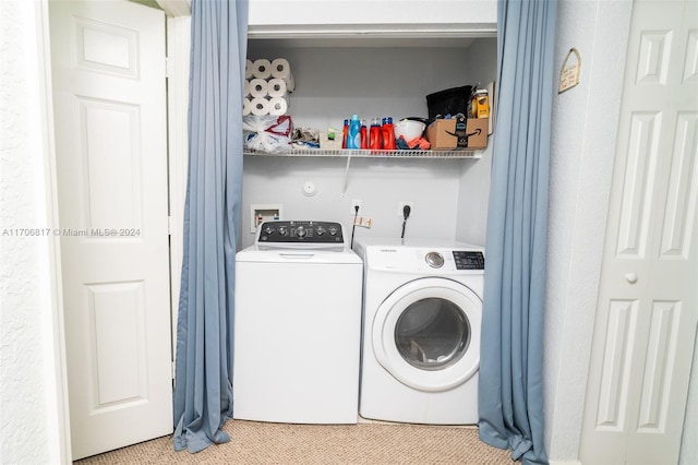 laundry room with carpet flooring and washing machine and dryer