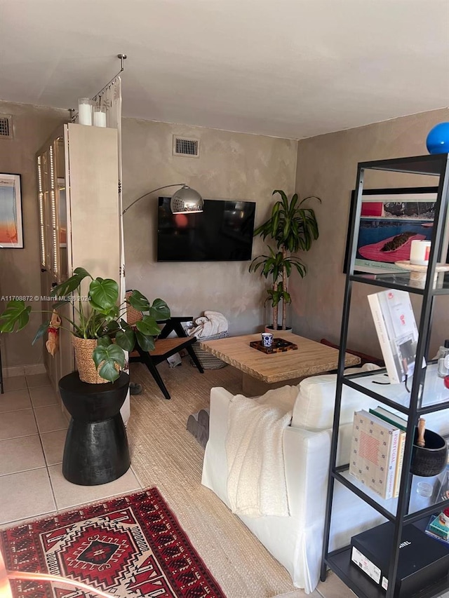 living room featuring tile patterned floors