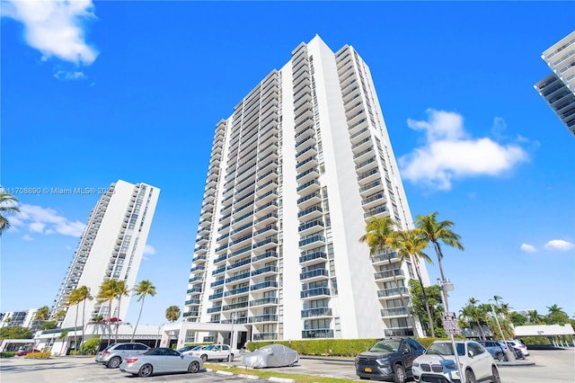 3675 N Country Club Dr Unit 105, Aventura, FL 33180 - recreation room with baseboards, dark carpet, a drop ceiling, and billiards