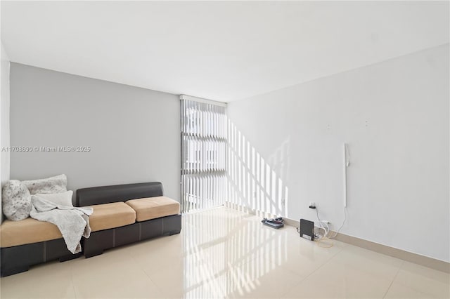 living room with light tile patterned floors