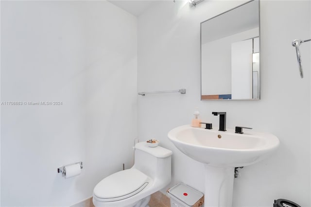 bathroom featuring toilet