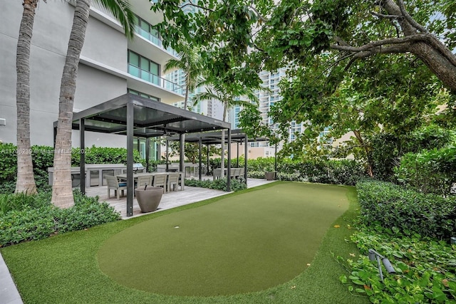 view of property's community featuring a patio area