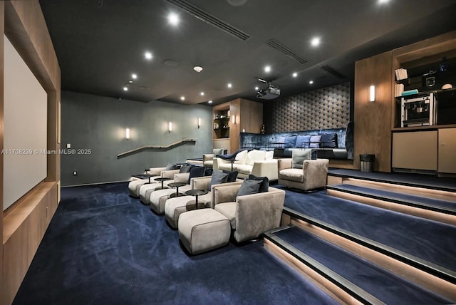 cinema room with recessed lighting, visible vents, and carpet floors