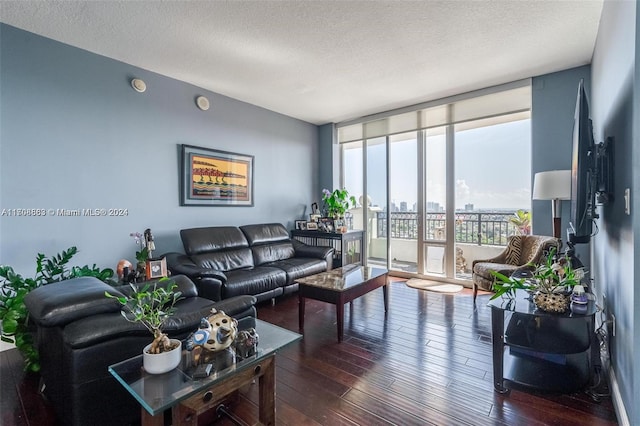 3232 SW 22nd Ter Unit 1903, Miami, FL 33145 - living area featuring floor to ceiling windows, hardwood / wood-style floors, and a textured ceiling