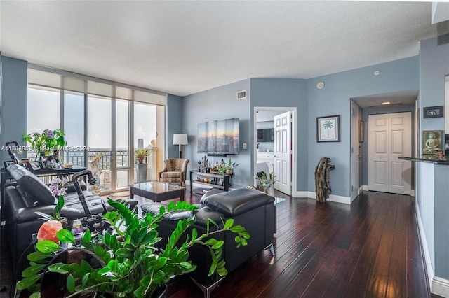 3232 SW 22nd Ter Unit 1903, Miami, FL 33145 - living area featuring dark wood-type flooring and baseboards