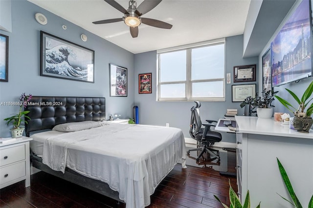 bedroom featuring dark hardwood / wood-style floors and ceiling fan