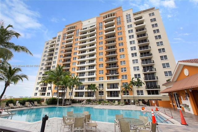 view of swimming pool featuring a patio