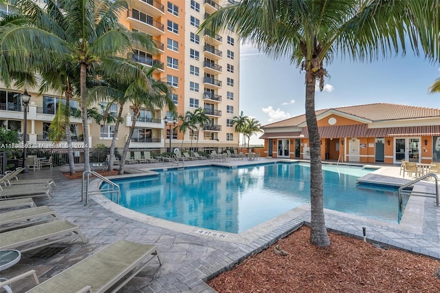 view of swimming pool with a patio