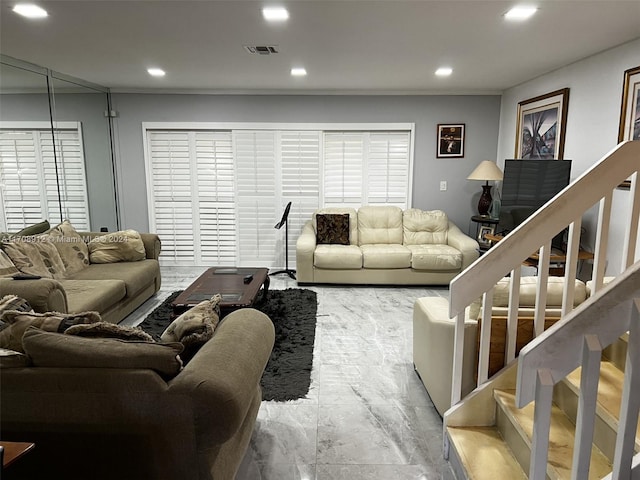 living room with crown molding