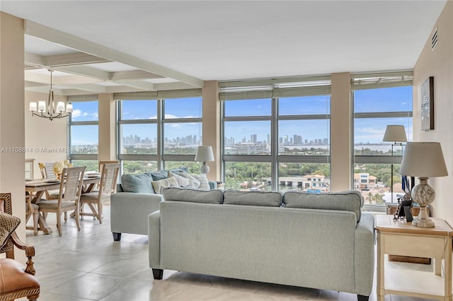 living room with a wealth of natural light and a notable chandelier