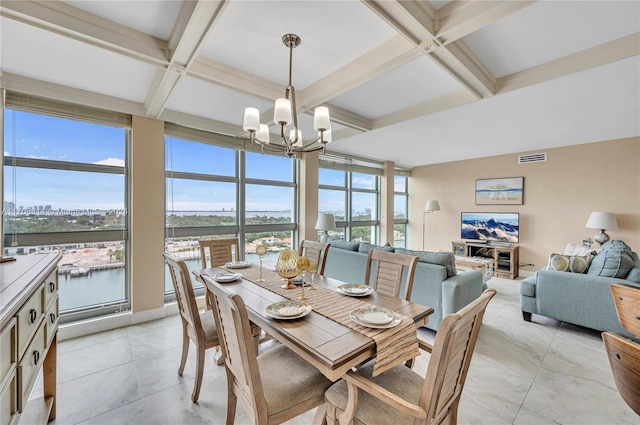 tiled dining space with beamed ceiling, coffered ceiling, and an inviting chandelier