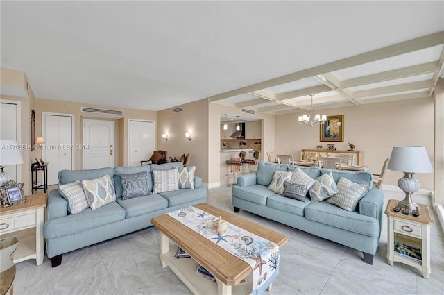 living room with beamed ceiling, coffered ceiling, and a notable chandelier