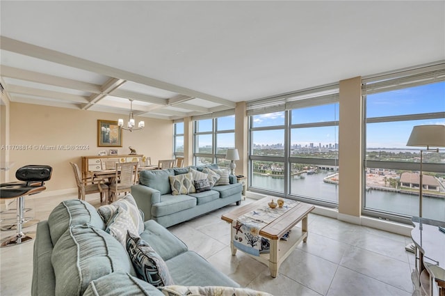 living room featuring coffered ceiling, a water view, beamed ceiling, a notable chandelier, and light tile patterned flooring